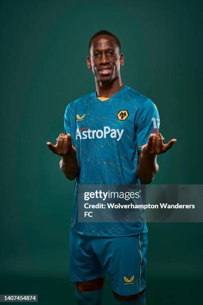 Willy Boly of Wolverhampton Wanderers poses for a portrait in the Wolverhampton Wanderers Season 2022/23 Away Kit at The Sir Jack Hayward Training...