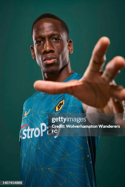 Willy Boly of Wolverhampton Wanderers poses for a portrait in the Wolverhampton Wanderers Season 2022/23 Away Kit at The Sir Jack Hayward Training...
