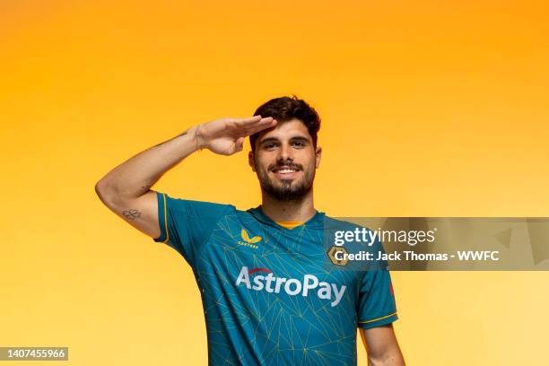 Pedro Neto of Wolverhampton Wanderers poses for a portrait in the Wolverhampton Wanderers Season 2022/23 Away Kit at The Sir Jack Hayward Training...