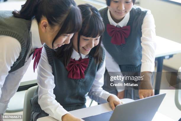 high school girl studying at school - 私立学校 ストックフォトと画像