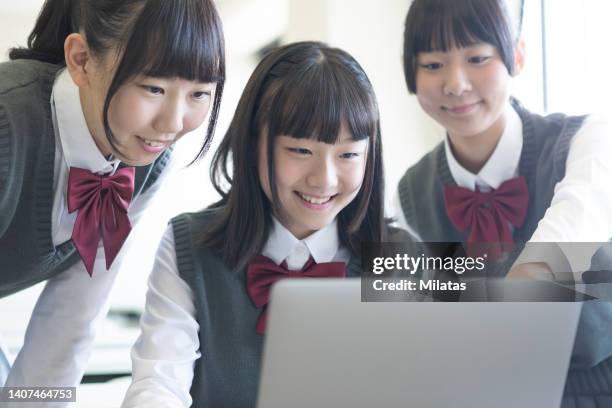 high school girl studying at school - 私立学校 ストックフォトと画像