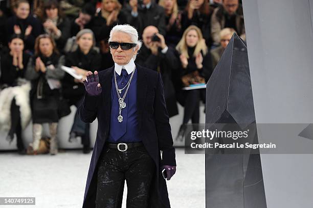 Designer Karl Lagerfeld acknowledges the applause of the audience after the Chanel Ready-To-Wear Fall/Winter 2012 show as part of Paris Fashion Week...