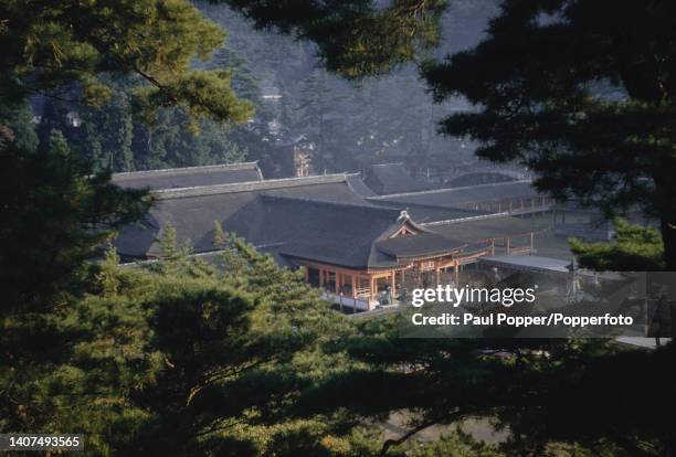 Visitors at the Itsukushima Shrine, a Shinto shrine near Miyajima on the island of Itsukushima in the Chugoku region of Honshu in Japan in October...