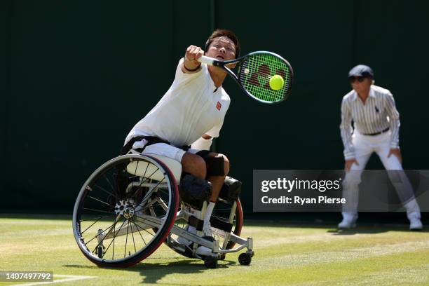 Shingo Kunieda of Japan plays a backhand against Joachim Gerard of Belgium during their Men's Wheelchair Singles Semi Final match on day twelve of...