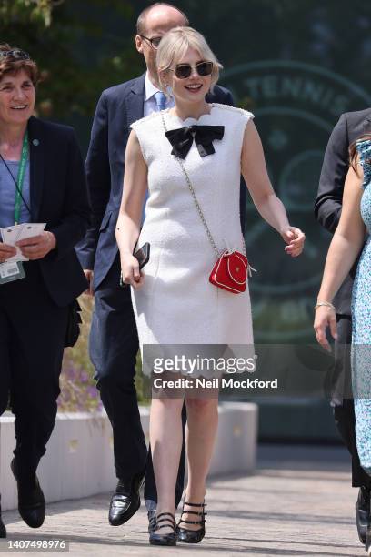 Rami Malek and Lucy Boynton arrive at Wimbledon 2022 - Day 12 at All England Lawn Tennis and Croquet Club on July 08, 2022 in London, England.