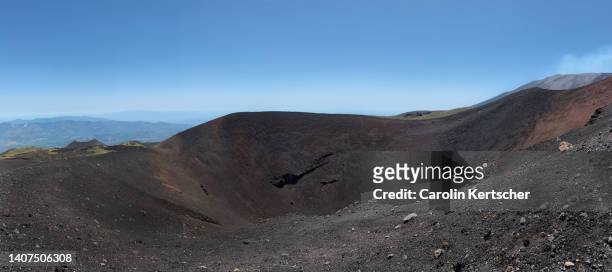 group of people walking on an extinct etna crater on a sunny day | sicily, italy - volcanic landscape stock pictures, royalty-free photos & images