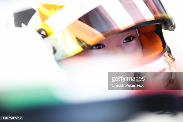 Yuki Tsunoda of Japan and Scuderia AlphaTauri prepares to drive in the garage during practice ahead of the F1 Grand Prix of Austria at Red Bull Ring...
