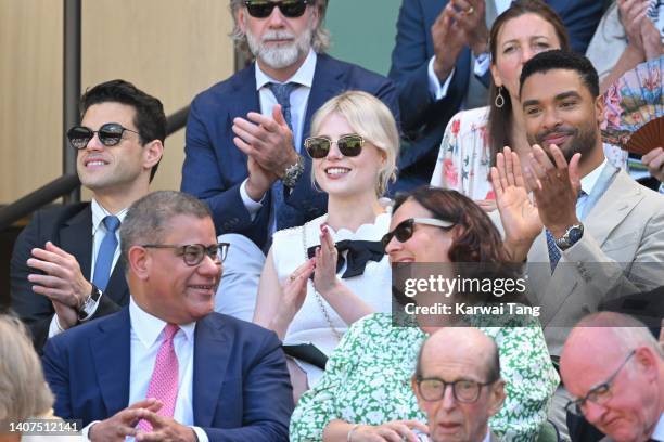 Rami Malek, Lucy Boynton and Regé-Jean Page attend day 12 of the Wimbledon Tennis Championships at All England Lawn Tennis and Croquet Club on July...