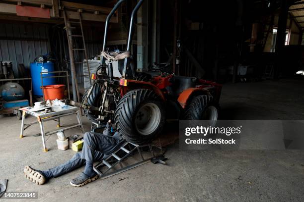 Tractor Engineer 677 Mechanic Working On Tractor Stock Photos, High-Res Pictures, and ...