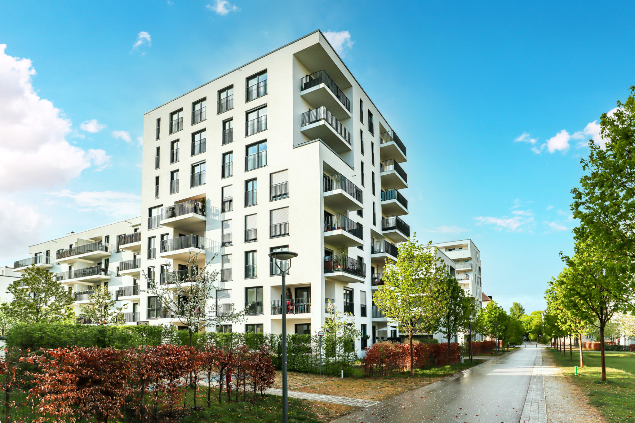 Cityscape of a residential area with modern apartment buildings, new green urban landscape in the city Cityscape of a residential area with modern apartment buildings, new green urban landscape in the city