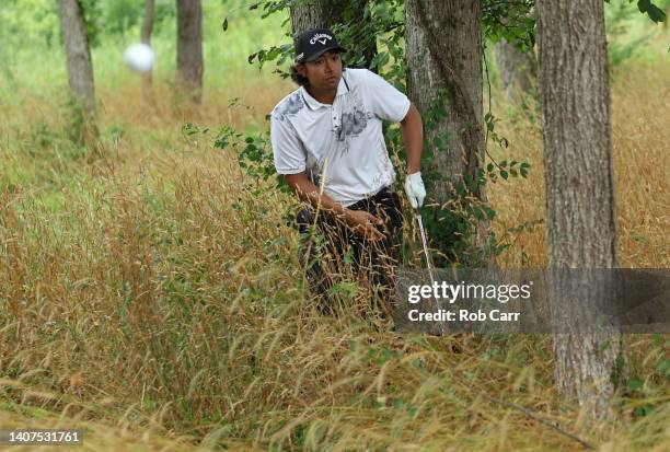 Gavin Kyle Green of Malaysia plays his second shot from the deep rough on the sixth hole during the second round of the Barbasol Championship at...
