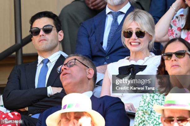 Rami Malek and Lucy Boynton attend day 12 of the Wimbledon Tennis Championships at All England Lawn Tennis and Croquet Club on July 08, 2022 in...