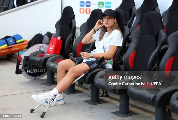 Alexia Putellas of Spain looks on from the stands, as they miss the match due to an injury prior to the UEFA Women's Euro 2022 group B match between...