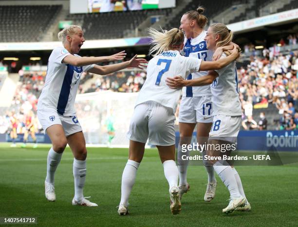 Linda Sallstrom celebrates with Sanni Franssi, Adelina Engman and Eveliina Summanen of Finland after scoring their team's first goal during the UEFA...