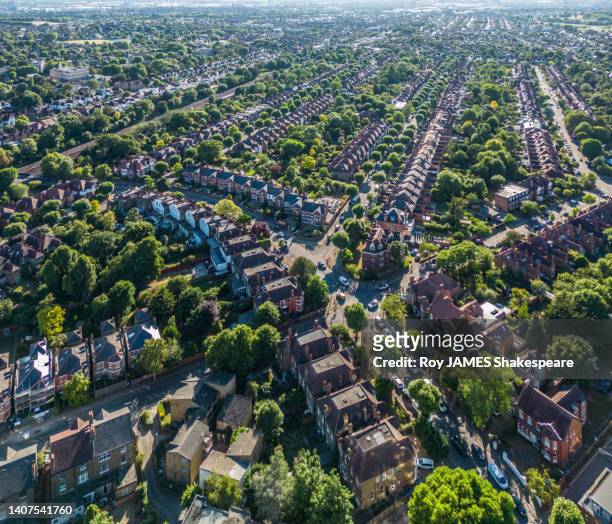 london from drone perspective,  looking south west over the terrace houses and treelined streets between willesden green and kilburn - roy james shakespeare stock pictures, royalty-free photos & images