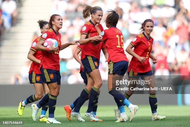 Irene Paredes of Spain celebrates with teammates after scoring their team's first goal during the UEFA Women's Euro 2022 group B match between Spain...