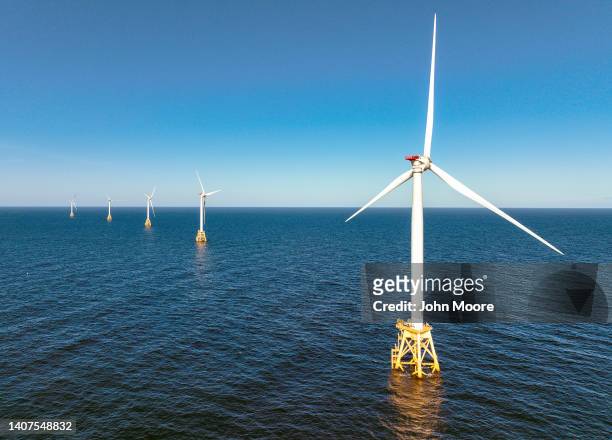 In an aerial view, wind turbines generate electricity at the Block Island Wind Farm on July 07, 2022 near Block Island, Rhode Island. The first...
