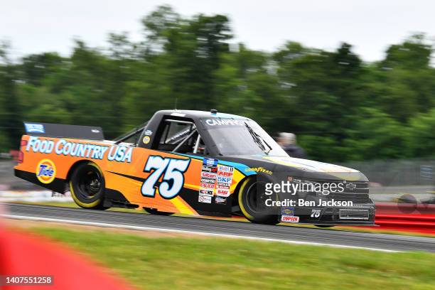 Parker Kligerman, driver of the Food Country USA/Tide Chevrolet, drives during practice for the NASCAR Camping World Truck Series O'Reilly Auto Parts...