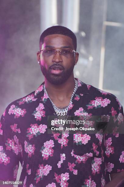 Tristan Thompson watches the Giveon concert from the side of the main stage during Wireless Festival at Finsbury Park on July 08, 2022 in London,...