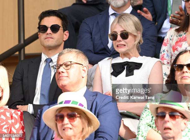 Rami Malek and Lucy Boynton attend day 12 of the Wimbledon Tennis Championships at the All England Lawn Tennis and Croquet Club on July 08, 2022 in...