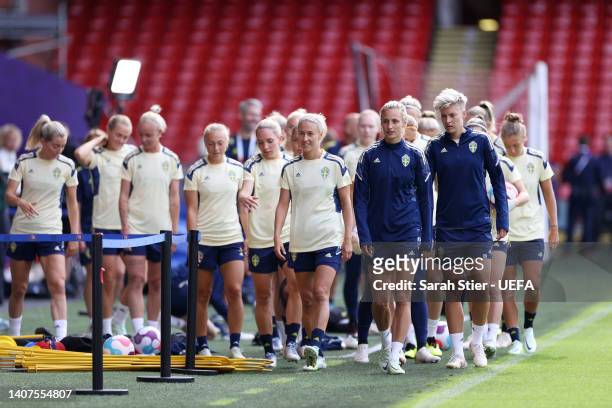 Nathalie Bjorn and team mates of Sweden enter the pitch to train during the UEFA Women's Euro 2022 Sweden Press Conference And Training Session at...