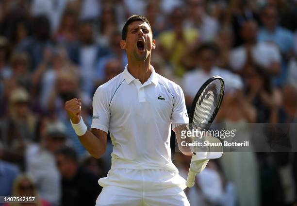 Novak Djokovic of Serbia celebrates match point against Cameron Norrie of Great Britain during the Mens' Singles Semi Final match on day twelve of...