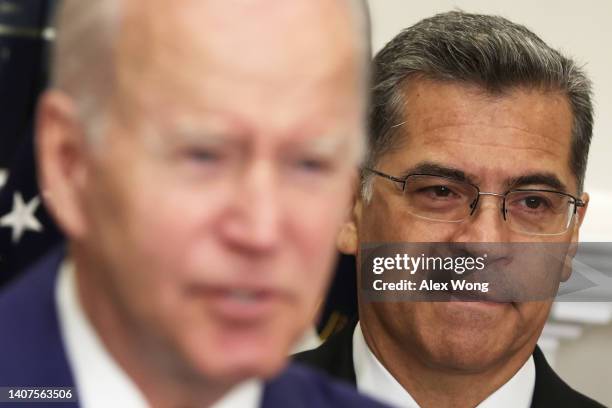 President Joe Biden delivers remarks on reproductive rights as Secretary of Health and Human Services Xavier Becerra listens during an event at the...