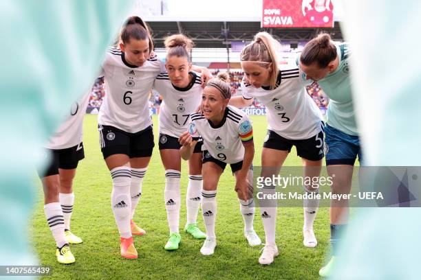Svenja Huth of Germany gives their team instructions in the huddle prior to the UEFA Women's Euro 2022 group B match between Germany and Denmark at...