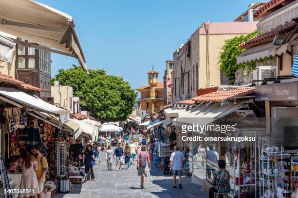 the famous socrates market street in old rhodes town, greece - rhodes old town stock pictures, royalty-free photos & images