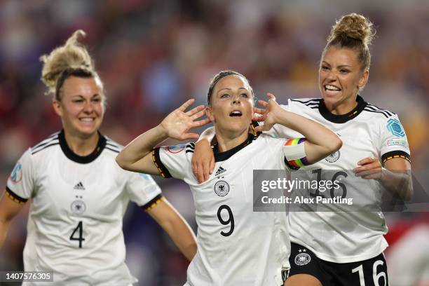 Svenja Huth celebrates with Lena Lattwein and Linda Dallmann of Germany after a goal which was later disallowed during the UEFA Women's Euro 2022...