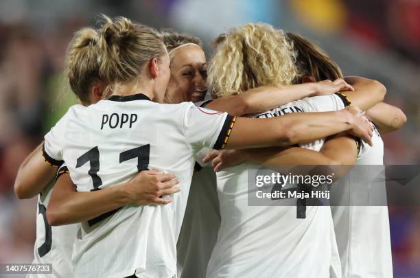 Lena Lattwein of Germany celebrates their team's third goal with teammates during the UEFA Women's Euro England 2022 group B match between Germany...