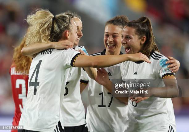 Lena Lattwein of Germany celebrates their team's third goal with teammates during the UEFA Women's Euro England 2022 group B match between Germany...