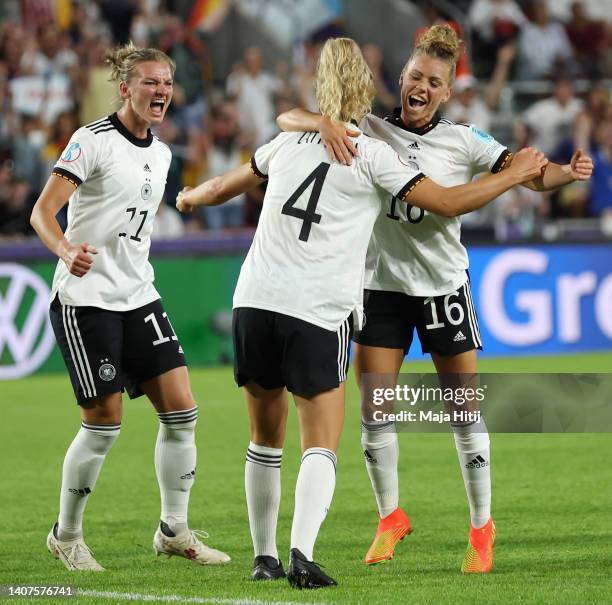 Lena Lattwein of Germany celebrates their team's third goal with teammates Alexandra Popp and Linda Dallmann during the UEFA Women's Euro England...