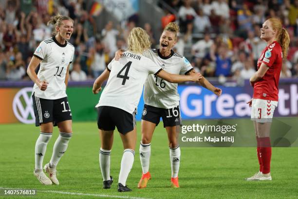 Lena Lattwein of Germany celebrates their team's third goal with teammates Alexandra Popp and Linda Dallmann during the UEFA Women's Euro England...