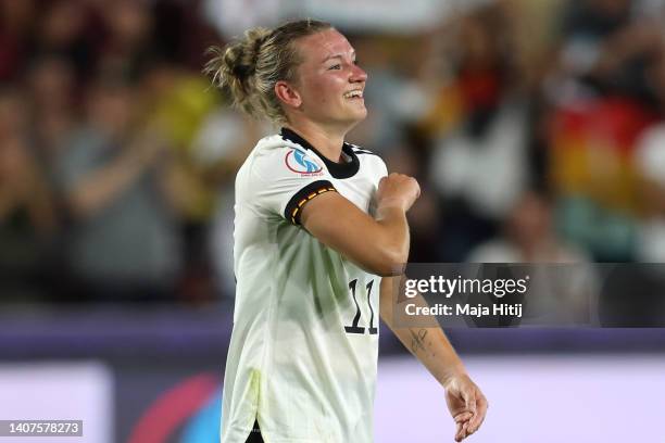 Alexandra Popp of Germany celebrates their team's fourth goal during the UEFA Women's Euro England 2022 group B match between Germany and Denmark at...