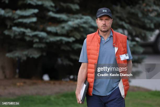 Carl M. Kawaja, Chair of the Capital Research and Management Company, walks to a morning session at the Sun Valley Resort for the Allen & Company Sun...