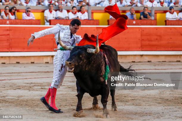 Bullfighter Daniel Luque performs with Fuente Ymbro's fighting bulls in the bullring on the third day of the San Fermin Running of the Bulls festival...