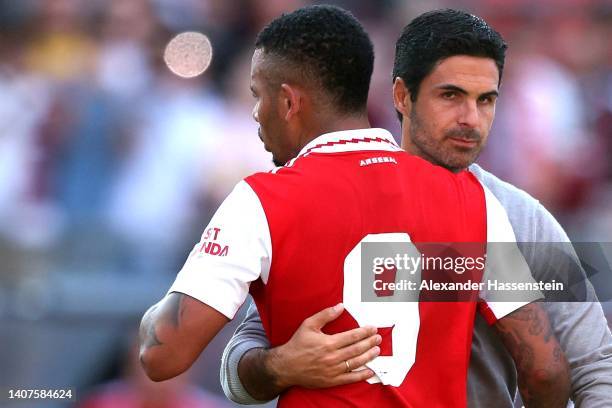 Gabriel Jesus of Arsenal reacts with head coach Mikel Arteta after the pre-season friendly match between 1. FC Nürnberg and Arsenal F.C. At...