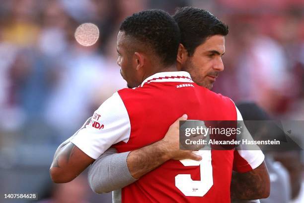 Gabriel Jesus of Arsenal reacts with head coach Mikel Arteta after the pre-season friendly match between 1. FC Nürnberg and Arsenal F.C. At...