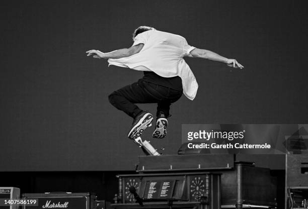 Eddie Vedder of Pearl Jam jumps while performing on stage as American Express Presents BST Hyde Park, in Hyde Park on July 08, 2022 in London,...