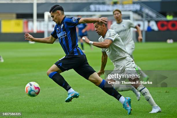 Raphael Obermair of Paderborn and Cristian Gamboa of Bochum fight for the ball during the pre-season friendly match between SC Paderborn and VfL...