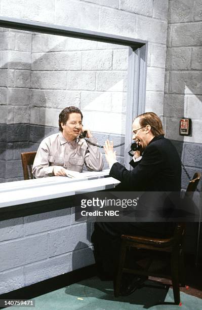 Episode 10 -- Pictured: Jon Lovitz as Manuel Noriega, Dana Carvey as President George H. W. Bush during the 'Noriega's Plan' skit on January 13, 1990...