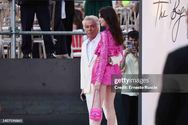 Giancarlo Giammetti and Anne Hathaway are seen arriving at the Valentino haute couture fall/winter 22/23 fashion show on July 08, at Piazza Di Spagna...