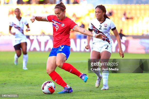 Carolina Venegas of Costa Rica fights for the ball with Chelsi Jadoo of Trinidad & Tobago during the match between Trinidad & Tobago and Costa Rica...