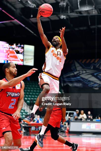 Corey Brewer of Bivouac drives to the basket against Jannero Pargo of the Triplets during the game in BIG3 Week Four at Comerica Center on July 08,...