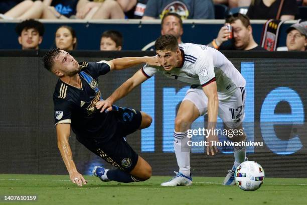 Kai Wagner of Philadelphia Union and Drew Skundrich of D.C. United challenge for the ball during the second half at Subaru Park on July 08, 2022 in...