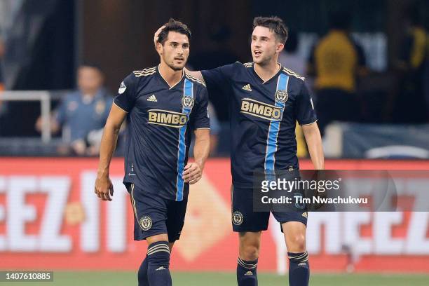 Julián Carranza and Leon Flach of Philadelphia Union celebrate a goal by Carranza during the first half against D.C. United at Subaru Park on July...