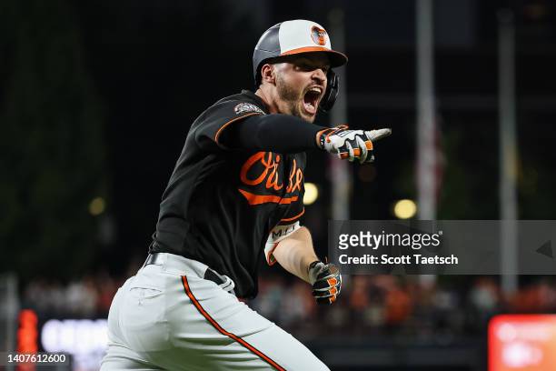 Trey Mancini of the Baltimore Orioles celebrates after hitting a walk off single against the Los Angeles Angels during the ninth inning at Oriole...