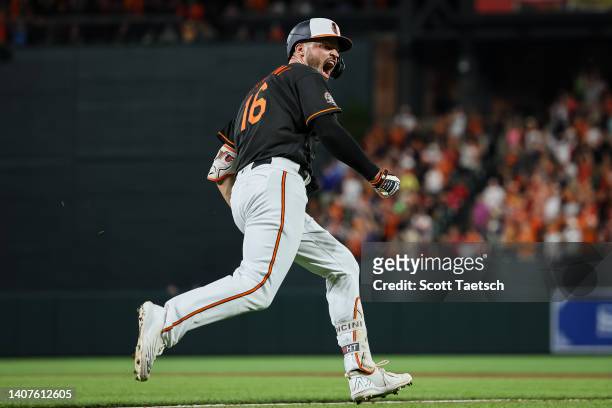 Trey Mancini of the Baltimore Orioles celebrates after hitting a walk off single against the Los Angeles Angels during the ninth inning at Oriole...