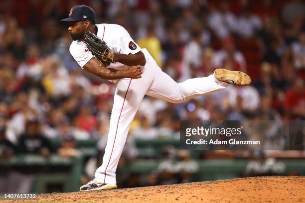 Jackie Bradley Jr. #19 of the Boston Red Sox pitches in the ninth inning of a game against the New York Yankees at Fenway Park on July 8, 2022 in...